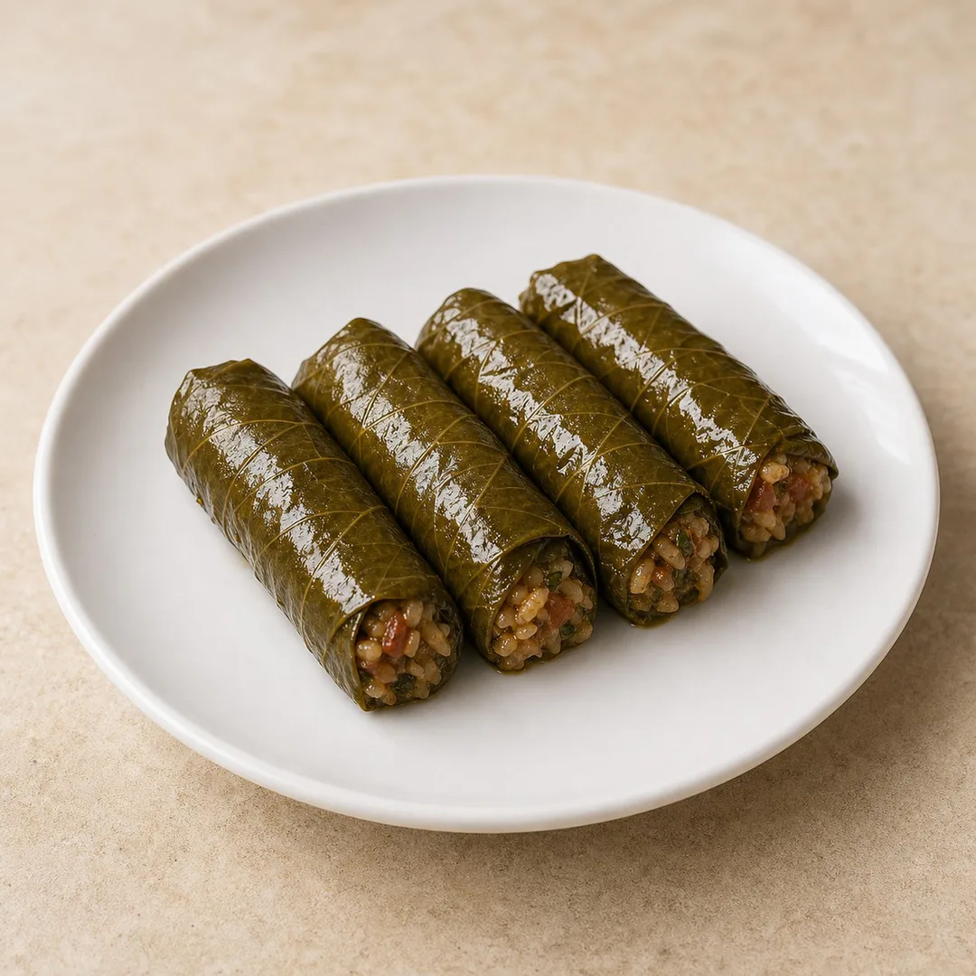 AI-assisted menu preview of Dolma | Stuffed Grape Leaves (4) for Mezze Cafe in South Austin