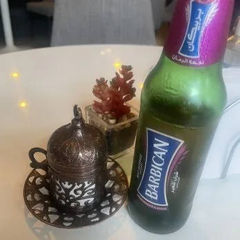Barbican pomegranate malt drink with Turkish coffee at Mezze Cafe Austin