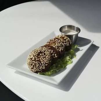 Sesame-crusted falafel with tahini dip at Mezze Cafe Austin