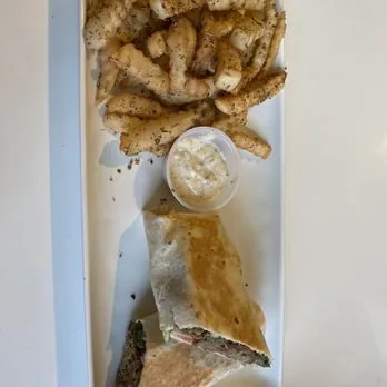 Gyro wrap with seasoned fries and garlic dip at Mezze Cafe Austin
