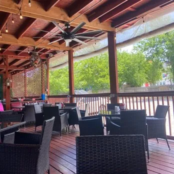 Covered patio deck by day at Mezze Cafe South Austin
