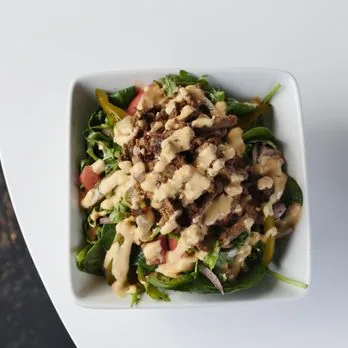 Beef shawarma salad bowl with tahini dressing at Mezze Cafe Austin